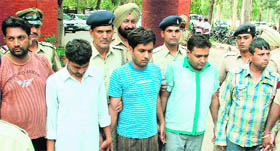 The accused in police custody at the Mani Majra police station in Chandigarh on Friday. 