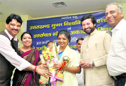 Dr Anjana Joshi of the Astrology Department of Uttarakhand Open University is felicitated at the conclusion of a seminar on astrology in Dehradun on Friday