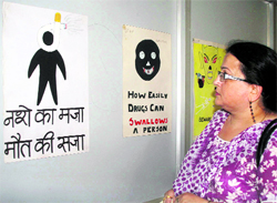 A visitor at a poster exhibition on International Day against Drug Abuse and Illicit Trafficking organised by the Department of Students Welfare, University of Jammu, on Friday
