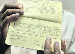 On record Daleep Kaurs son Rakha Singh shows a passbook with an entry of Rs 4 that he received as child pension every month in Ludhiana on Friday. 