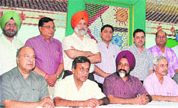 Contenders in the PMC elections address a press conference in Ludhiana on Friday.