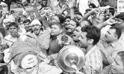 BJP activists protest against hike in the prices of LPG, diesel and kerosene at Sector 34 in Chandigarh 