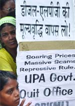 Activists from the Left parties hold placards during a demonstration against fuel price hike in New Delhi 