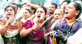 Activists of the BJP womens wing protest against fuel price hike in Amritsar on Saturday.