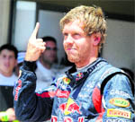 Red Bull's Sebastian Vettel celebrates after the qualifying session in Valencia on Saturday.