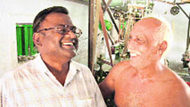 Parthibhan with one of the villagers