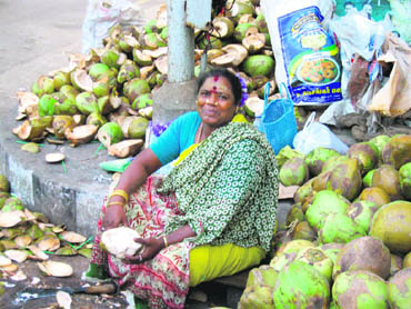The coconut woman near Ganesh temple has been around for a long time, say local people