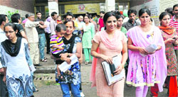 Candidates come out of Government Model Senior Secondary School, Karsan, which is one of the centres for CTET on Sunday.