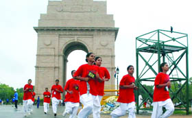 Children participate in an awareness run on International Day against Drug Abuse and Illicit Trafficking at India Gate in New Delhi on Sunday.