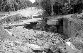 Gaping trouble A portion of a road that caved in following rain in Phase IX, Mohali, on Monday.