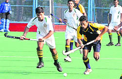 A match in progress between Maintenance Command and Air Force Headquarters at 3BRD Astroturf Hockey Ground in Chandigarh on Monday.