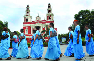 A group of scavengers from Rajasthan visits the Sacred Cathedral church in New Delhi on Tuesday. 