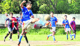 Players in action in a match in the Lala Nemi Dass Memorial District Football League in Dehradun on Tuesday.