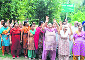 Residents protest against the construction of a disposal plant at a park in Kidwai Nagar, Ludhiana, on Wednesday. 