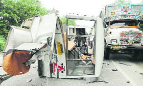 The mangled remains of a mini-bus that collided with a stationary truck on the Rahon-Machiwara road near Jharaudi on Wednesday.