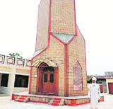 The tower housing a photo museum constructed in the former Presidents memory