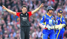 James Anderson (L) celebrates the wicket of Mahela Jayawardene (R) during their first ODI in London on Tuesday.