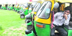Auto-motive LPG auto-rickshaws lined up at the rally ground in Sector 25 after drivers went on strike in Chandigarh