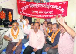 Ministerial employees stage a dharna in Dehradun on Thursday. 