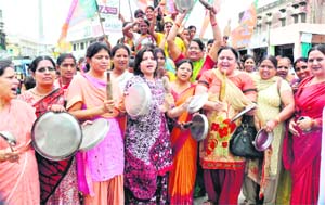 Woman activists hold a protest in Haridwar on Thursday. 