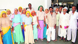 Aggrieved elderly residents of Rajpura Khalsa village at the district secretariat in Rewari.