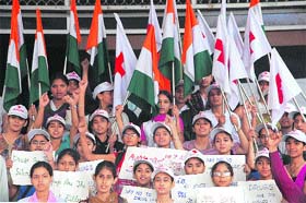 Students hold placards on drug abuse at an awareness rally organised by the Red Cross Society, Punjab branch, in Shimla on Thursday