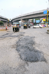 After The Tribune carried a picture of the road near BMC Chowk flyover with many potholes on Wednesday, the Municipal Corporation repaired the road on Thursday.