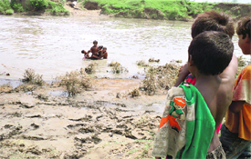  Children of jhuggis take bath in the polluted Kali Bein near Kang Sabu village in Nakodar