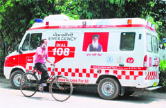 Chief Minister Prakash Singh Badals picture on display on an ambulance. 