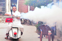 Councillor Gurpreet Singh Gogi carries out fogging in his constituency in Ludhiana on Thursday.