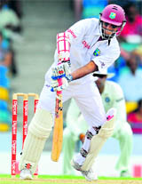 Shivnarine Chanderpaul plays a shot, during the second Test against India, at Kensington Oval in Barbados on Wednesday.