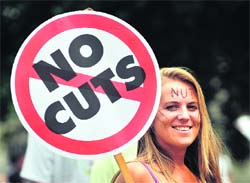 A woman holds a placard during a march in London on Thursday. 