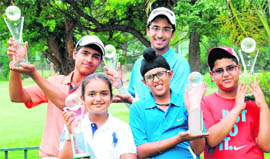 The winners are all smiles as they pose with their trophies in the Usha Chandigarh Junior Open Amateur Golf Championship at the Chandigarh Golf Club on Friday.