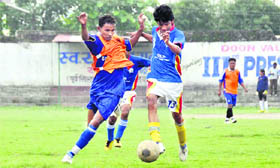 Players in action in Lala Nemi Dass Memorial District Football League at Pavilion ground in Dehradun on Saturday.