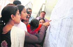 Admission seekers see the first cut-off list at the KVA DAV College for Women in Karnal