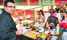 Chef Hitesh Arora strikes a pose during a cookery show in Ludhiana on Saturday