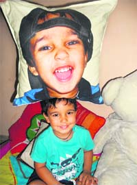 Gift a smile: Add that personal touch on cushion covers to wall clocks with pictures