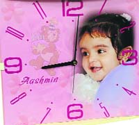 Gift a smile: Add that personal touch on cushion covers to wall clocks with pictures