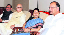 BJP leaders LK Advani, Sushma Swaraj, Arun Jaitley and JD (U) chief Sharad Yadav at an NDA meeting to take a call on the Lokpal Bill in New Delhi.