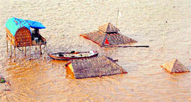 A view of submerged huts of sadhus at Sangam in Allahabad on Saturday after the rise in the water levels of the Ganga and the Yamuna.