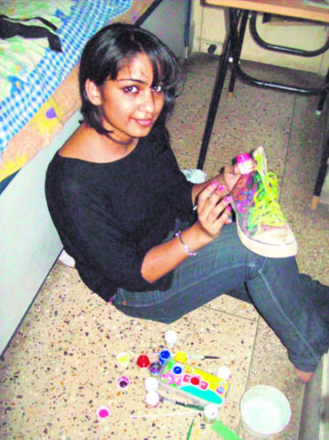 Shubhas leisure hours are spent painting exotic pictures and portraits on plain canvas shoes