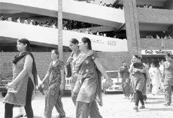 Candidates come out of an examination centre after appearing in the Punjab State Teachers Eligibility Test at Government Senior Secondary School, Phase IIIB1, Mohali, on Sunday