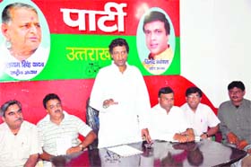 State SP chief Vinod Barthwal addresses a meeting in Dehradun on Sunday