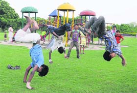 FUN TIME: Youths show their acrobatic skills at Atal Park in Karnal on Sunday