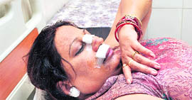 Malika, who was injured by snatchers, in a hospital in Ludhiana.