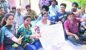 Applicants of AIEEE joint counselling in a jubilant mood after the Joint Admission Committee (JAC) gave a verdict in their favour, in Chandigarh