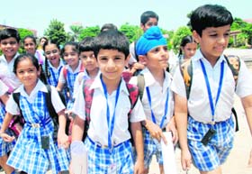 Students of Ashmah International School head home in Mohali. Private schools re-opened after summer vacation on Monday