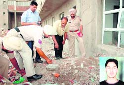 Police officials inspect the spot where Himanshu (inset) was hit with a brick at the institute near Rajpura