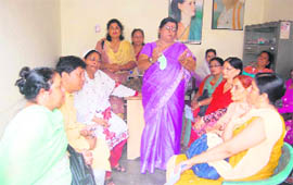 District president of the Mahila Congress Madhu Semwal addresses a meeting in Dehradun 
