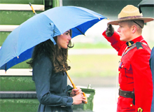 Duchess of Cambridge Kate Middleton is saluted by a Royal Canadian Mounted Police officer upon her arrival in Yellowknife, Canada. Britain's Prince William and his wife Kate are on a royal tour of Canada from June 30 to July 8